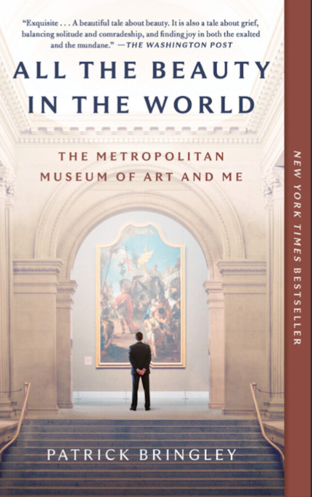 Book cover of Patrick Bringley's All the Beauty in the World. The cover uses warm pastel browns, except for a central rendering of a painting. The majority of the image is an archway that surrounds the painting and, standing in front of the painting with his back to us, an image of a Metropolitan Museum of Art guard. The guard is looking at the painting.